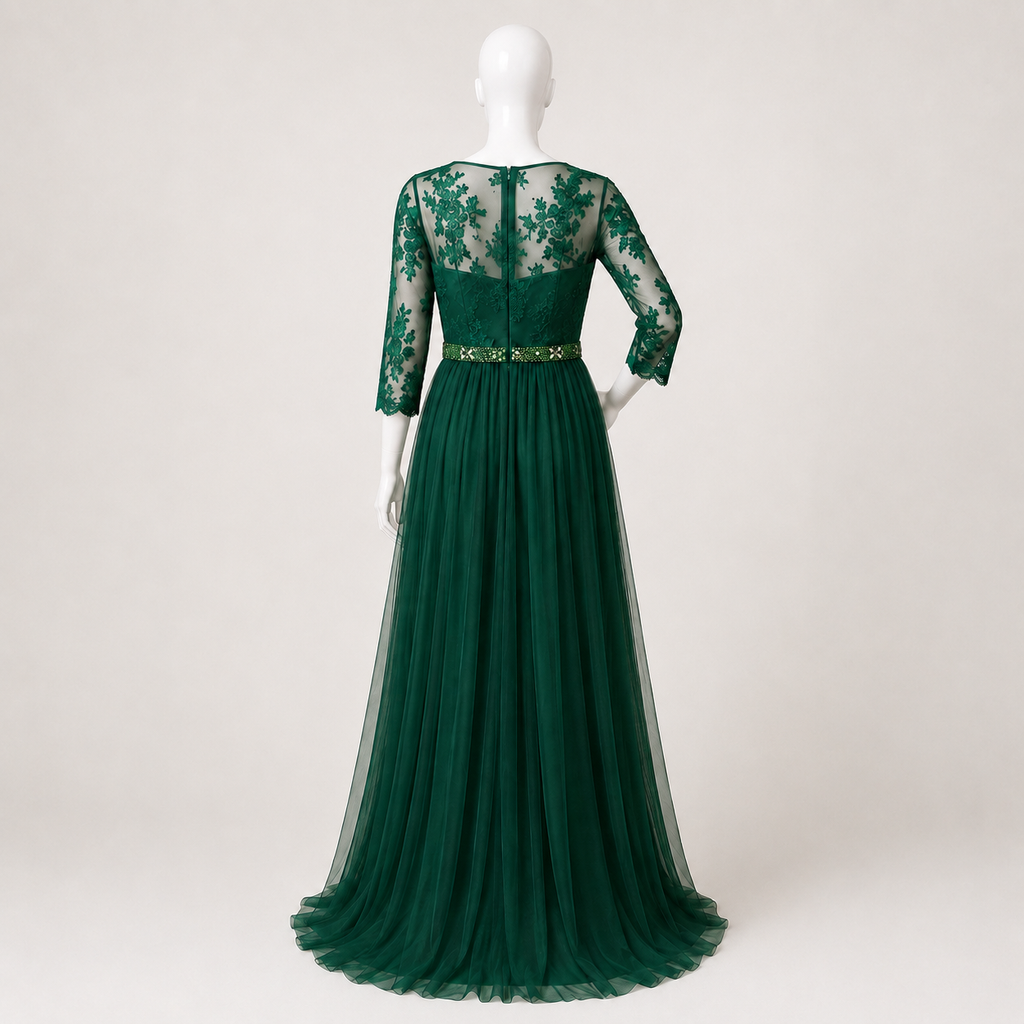 Long dark green dress with a lace bodice and a tulle skirt