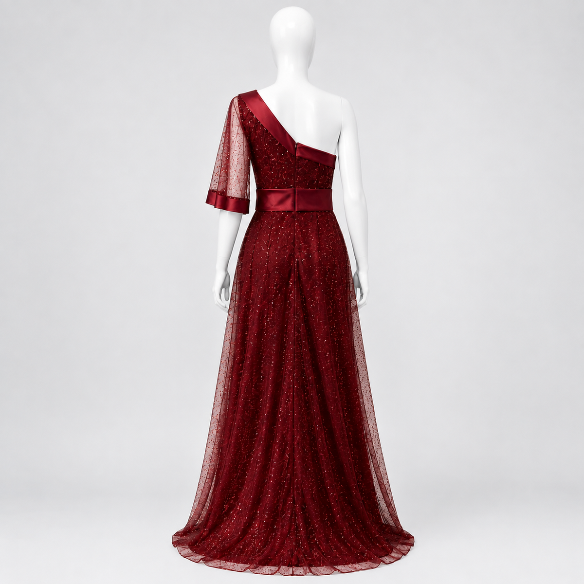 Long burgundy dress with tulle and an asymmetrical sleeve